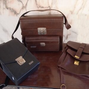 Tres bolsos de máquinas de fotografía